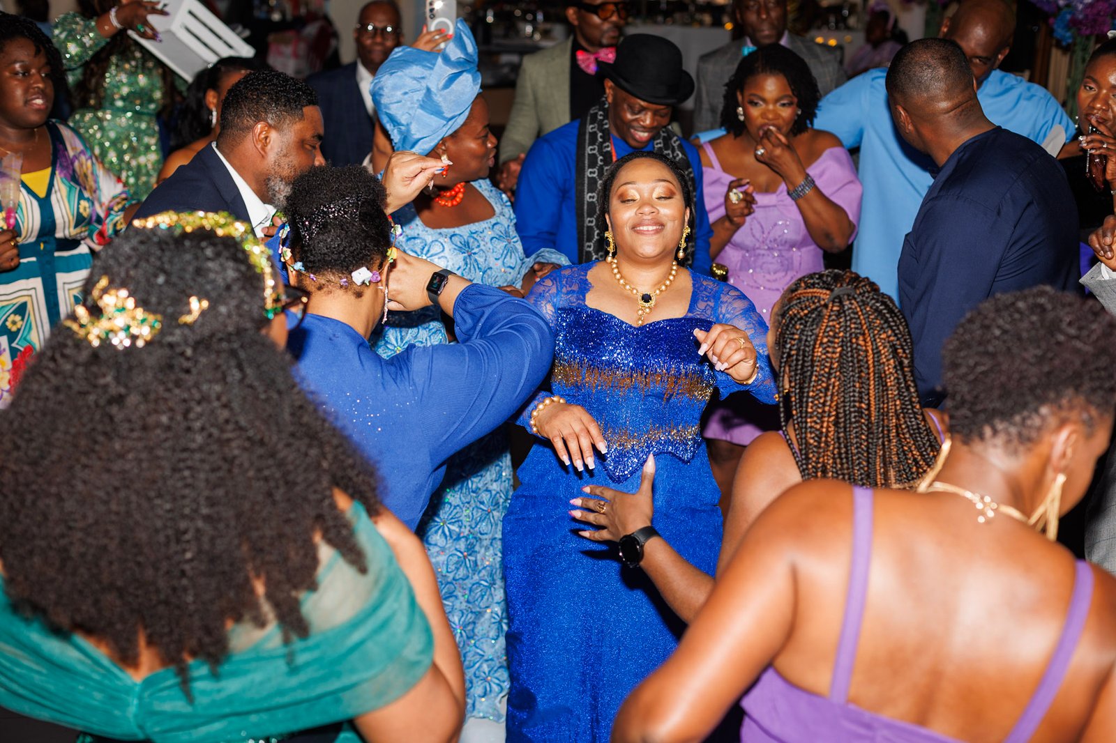 Wedding guests celebrating on the dance floor