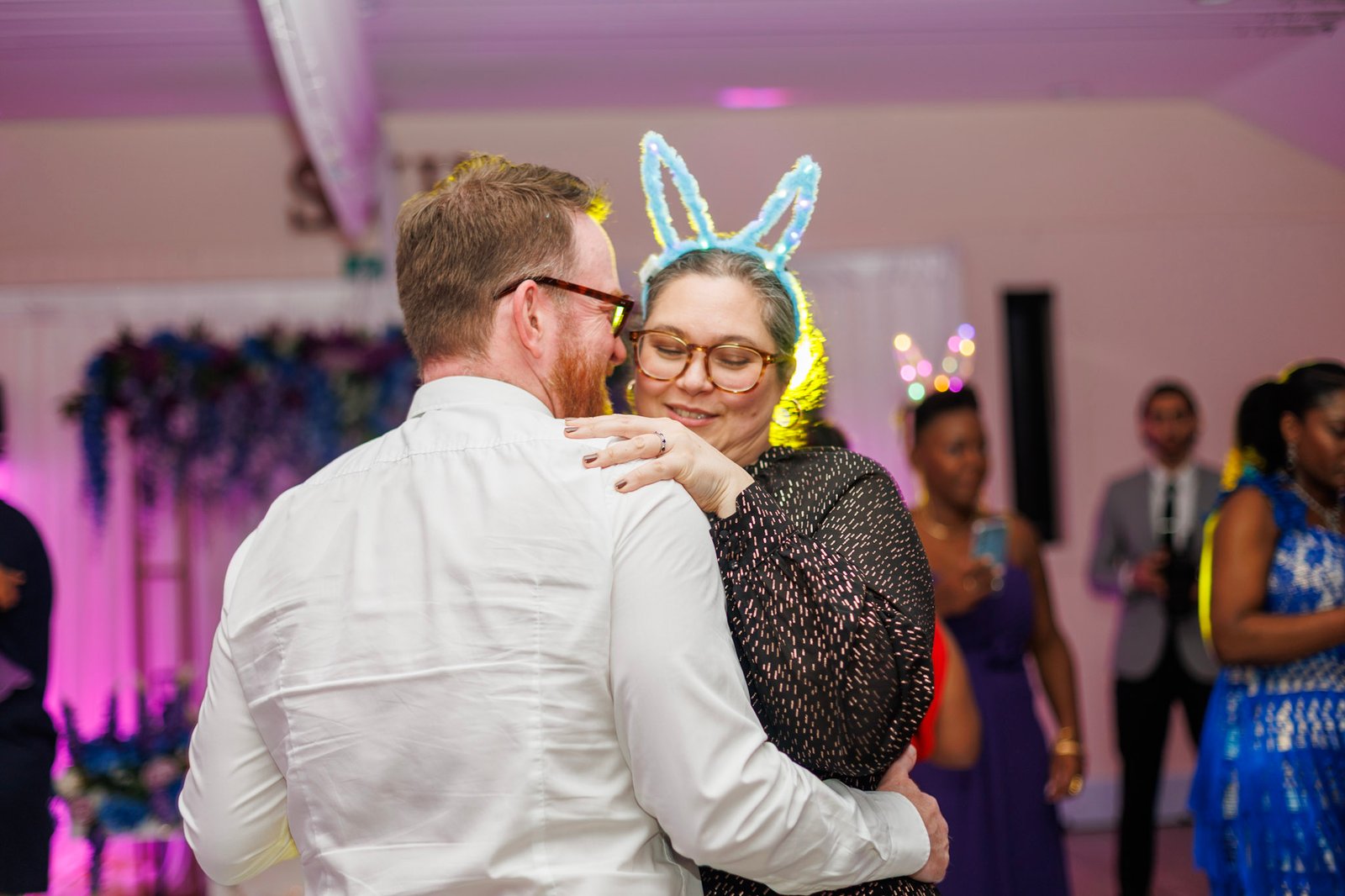 Wedding guests dancing together