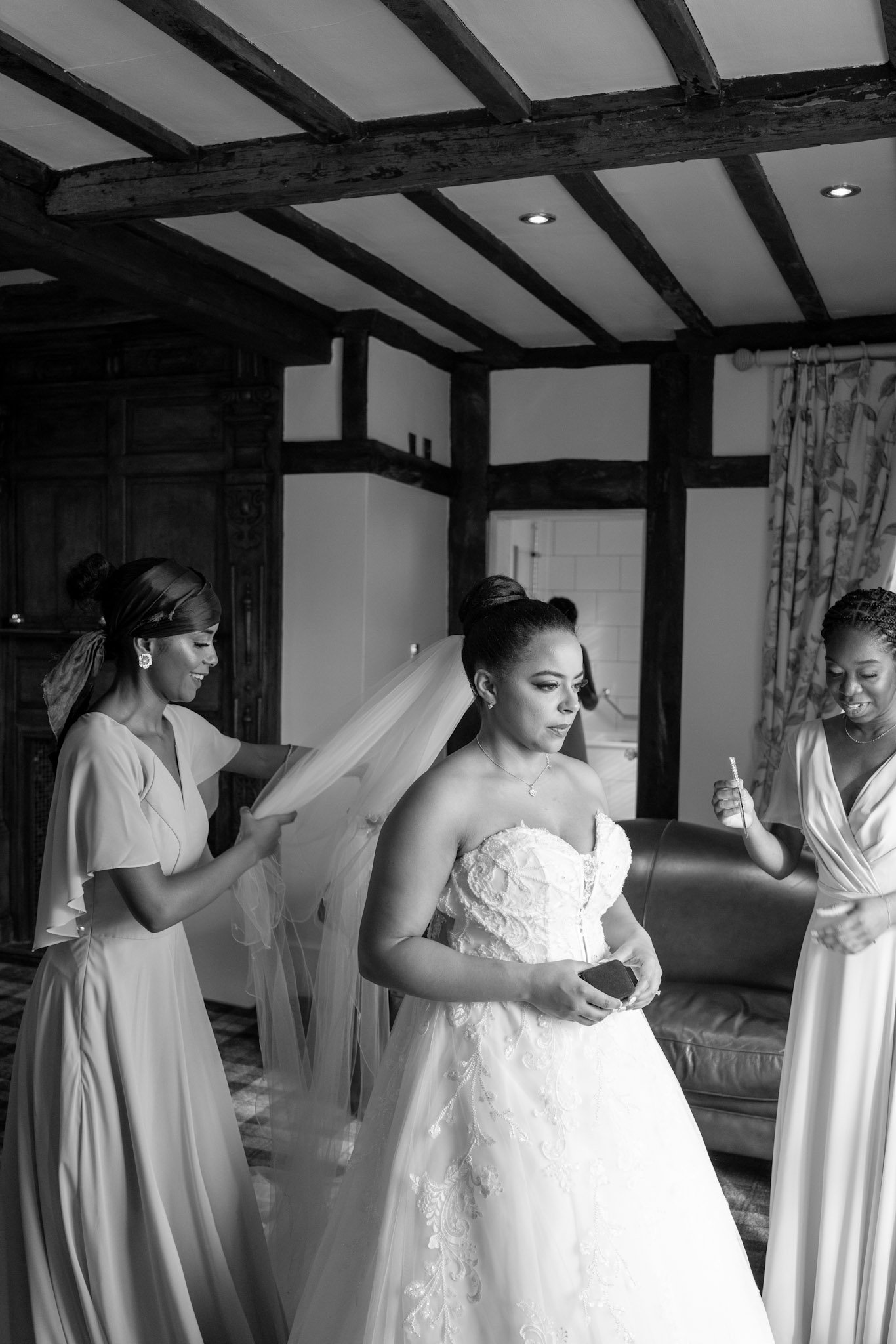 Bride preparing with bridesmaids