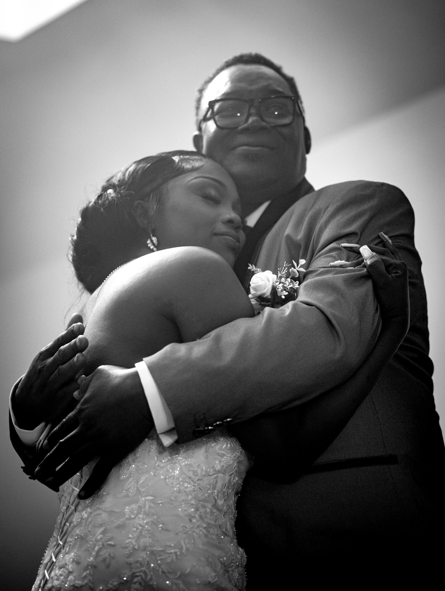 Bride and groom embracing
